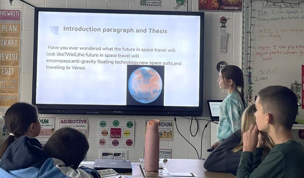 student giving presentation