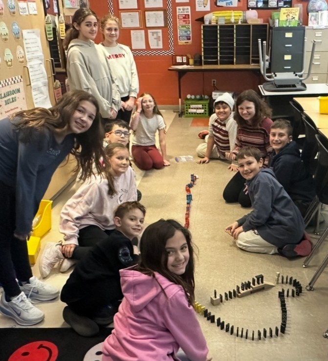 students and dominoes