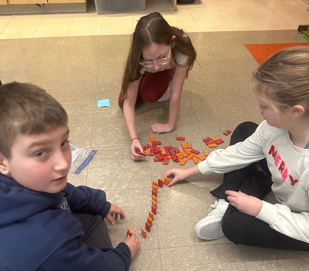 students and dominoes