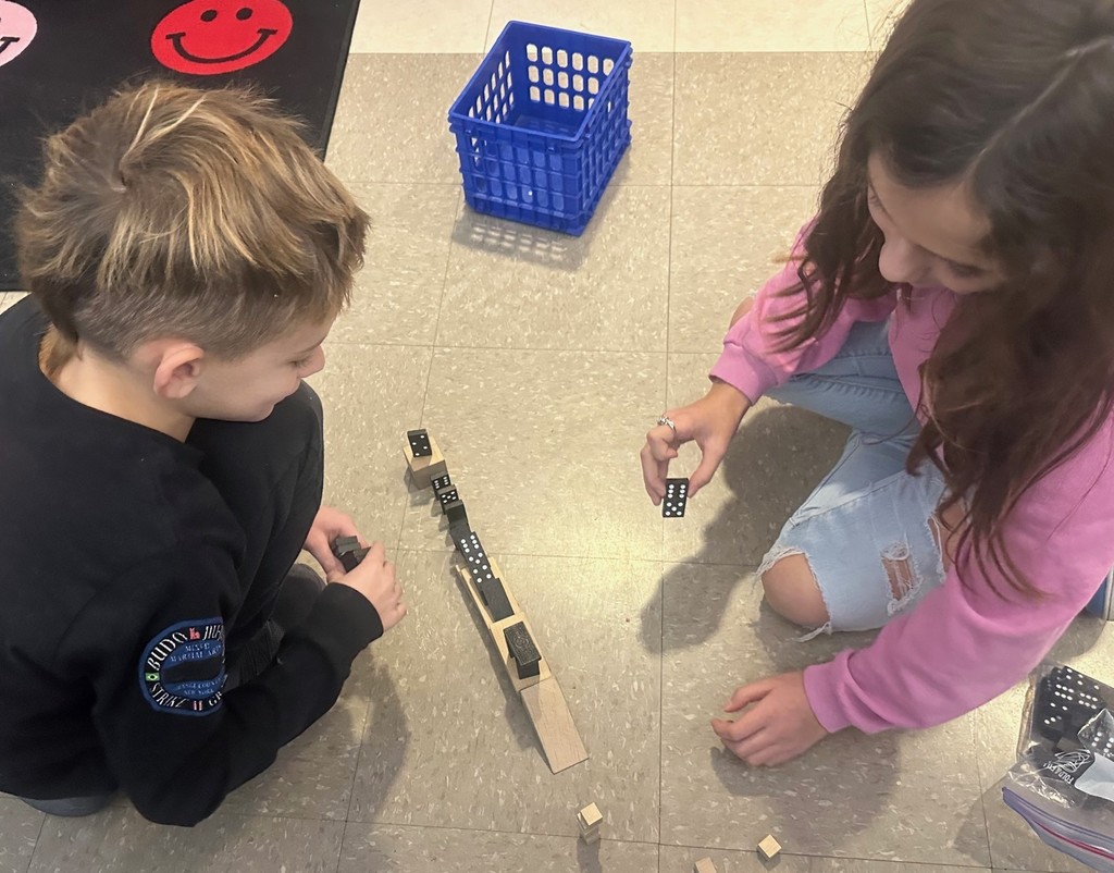 students and dominoes