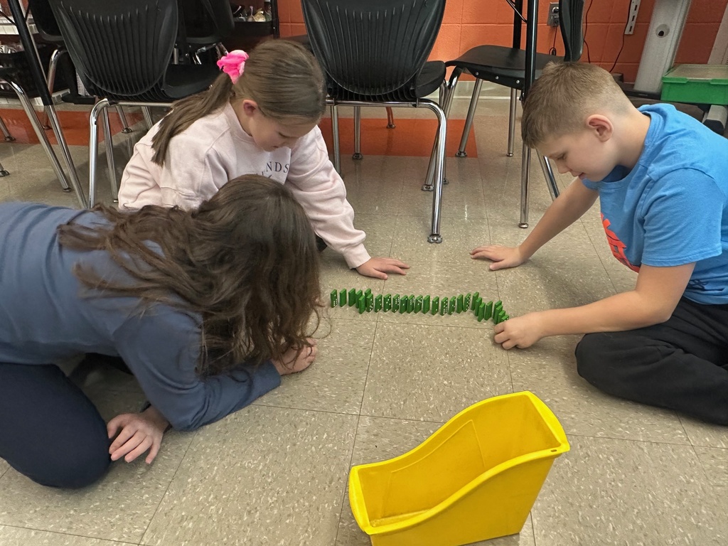students and dominoes