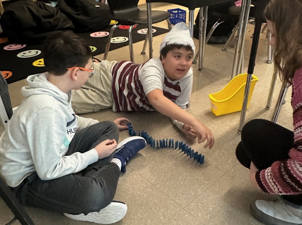 students and dominoes