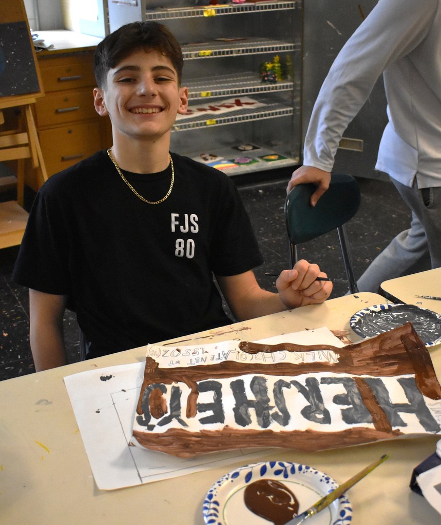 student in art class