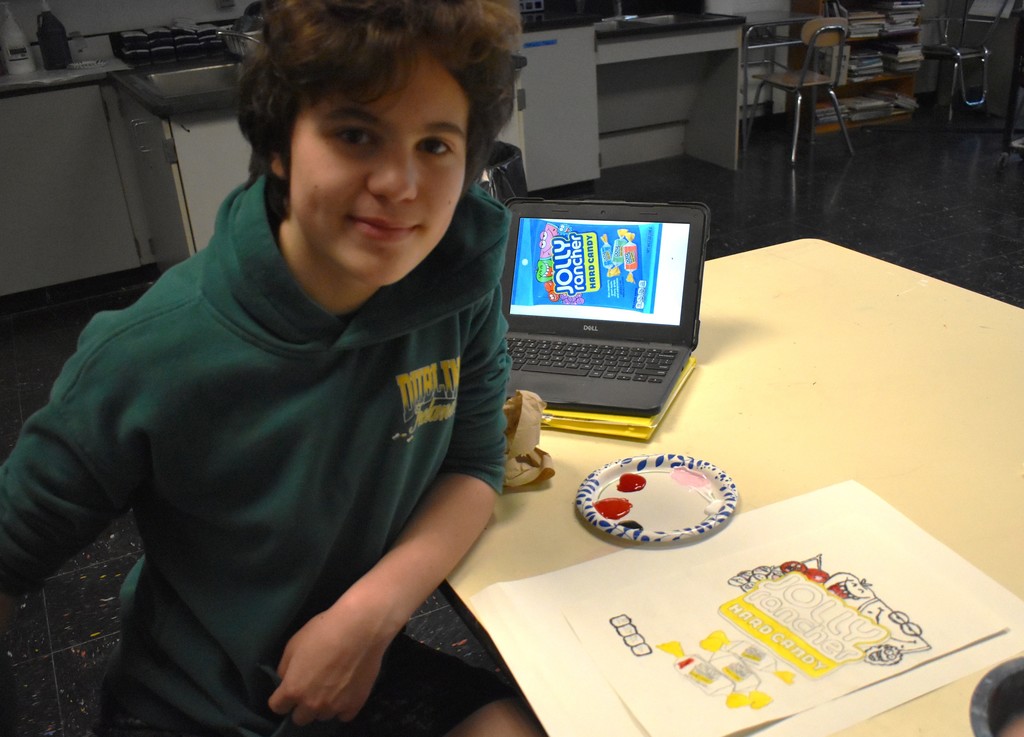 student in art class