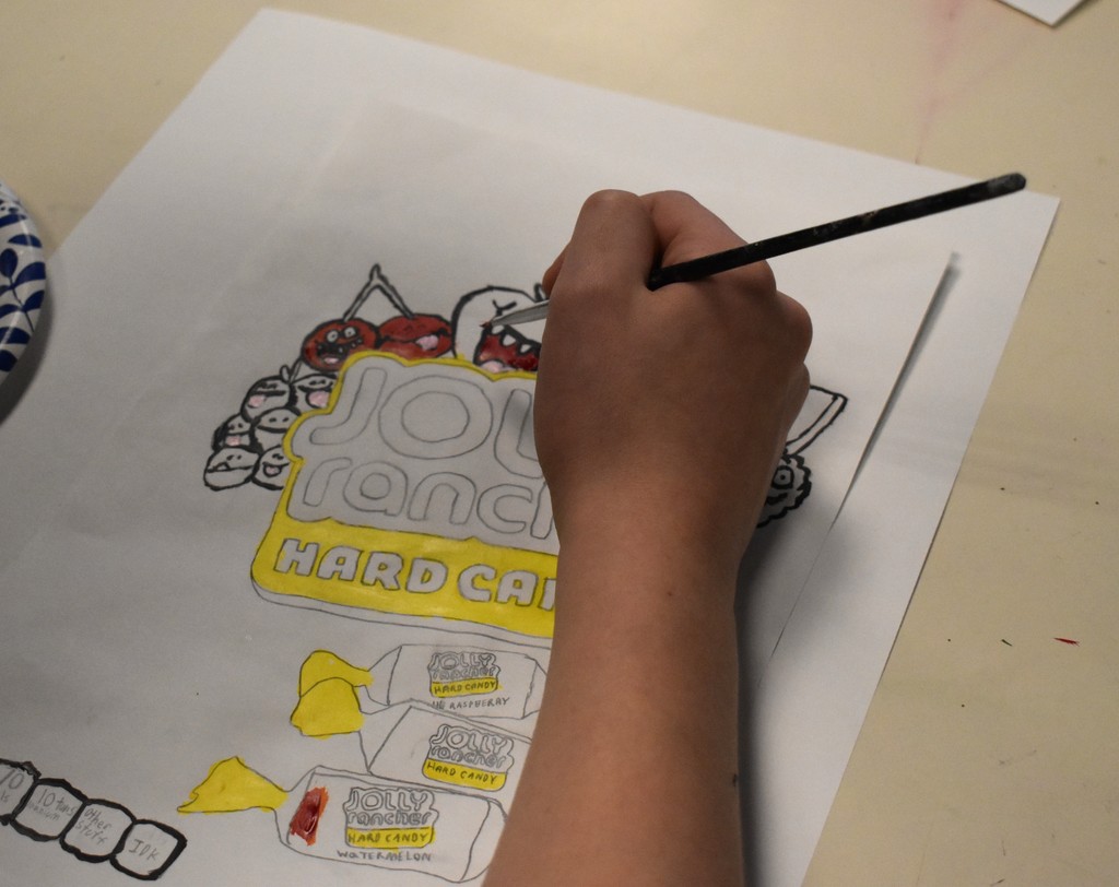 student in art class