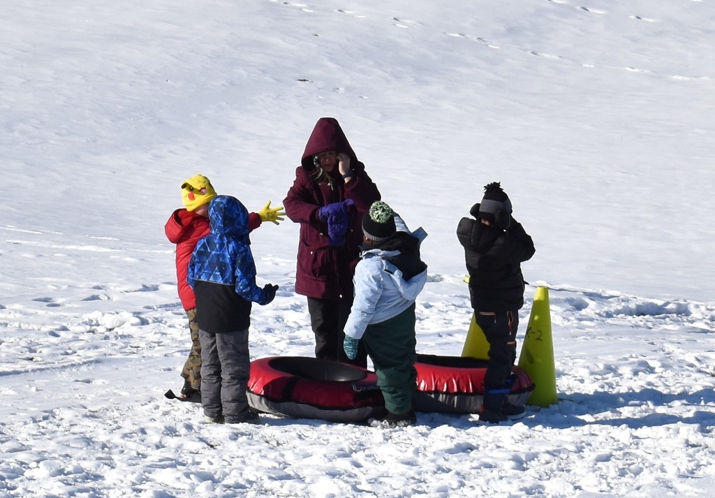 snow tubing students