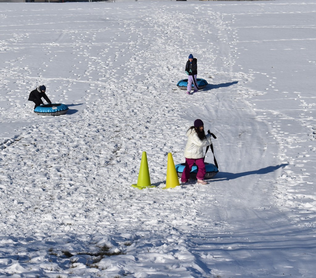 snow tubing students 