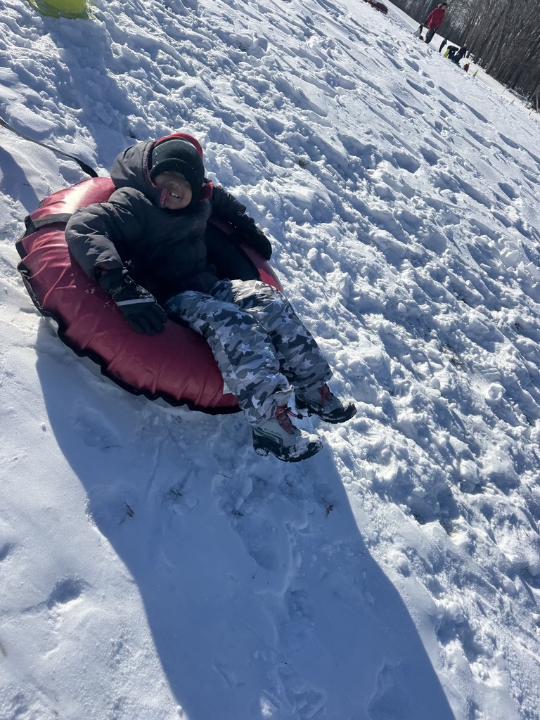 snow tubing students