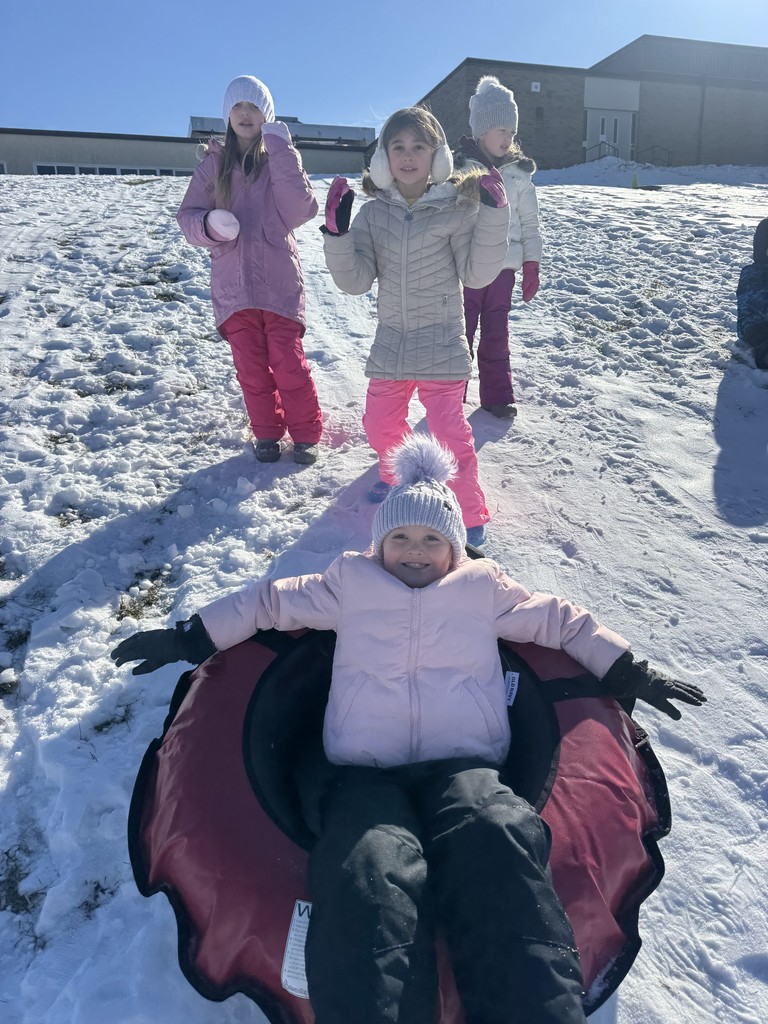 snow tubing students