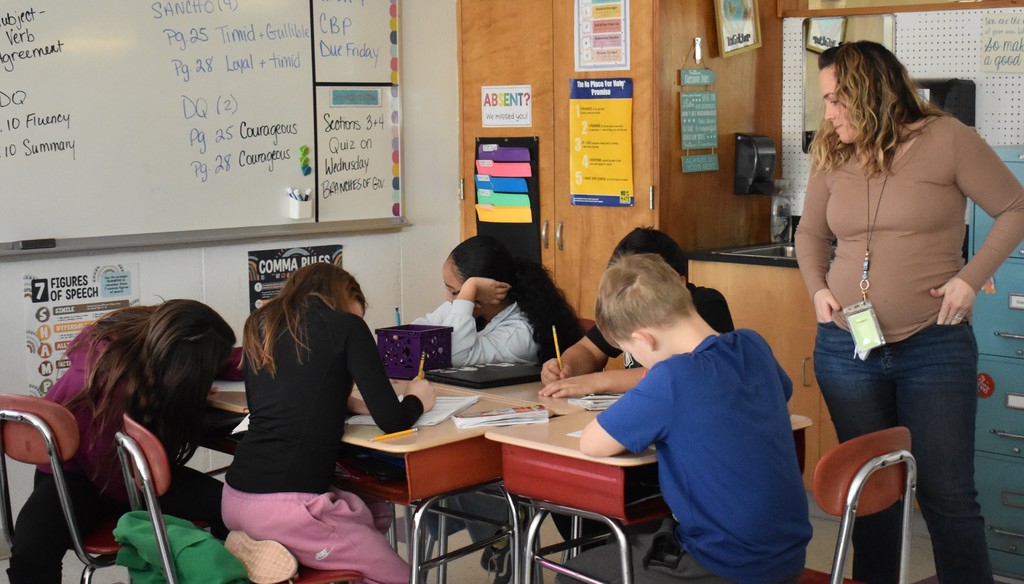 students and teacher in class