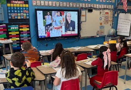 students watching video
