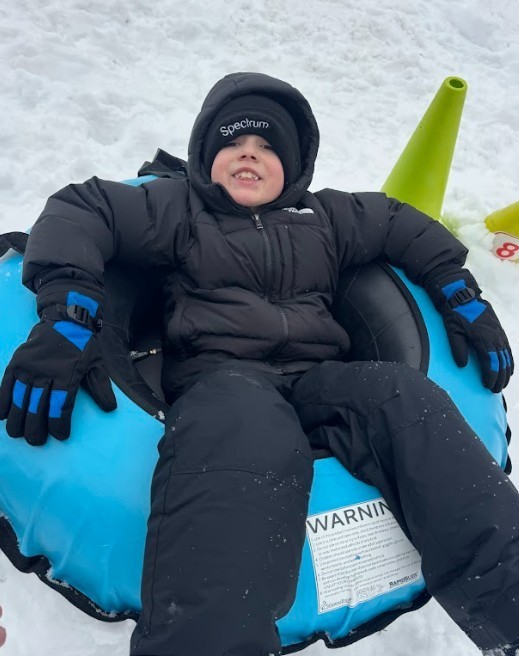 snow tubing students