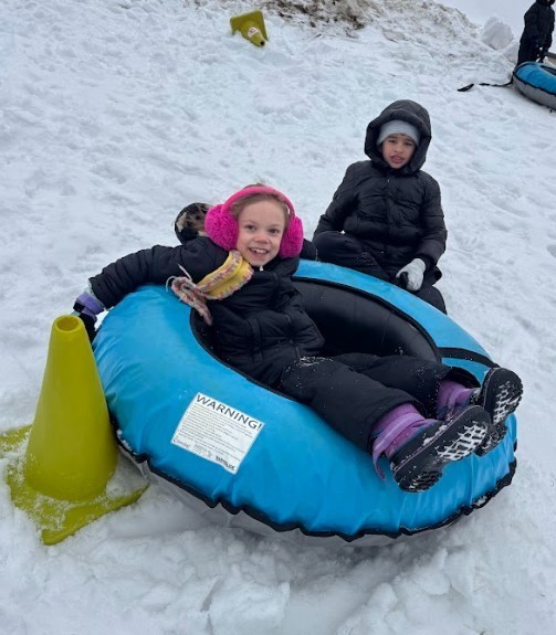 snow tubing students