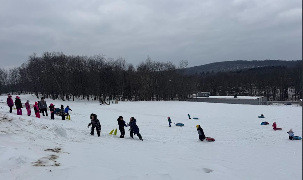 snow tubing students