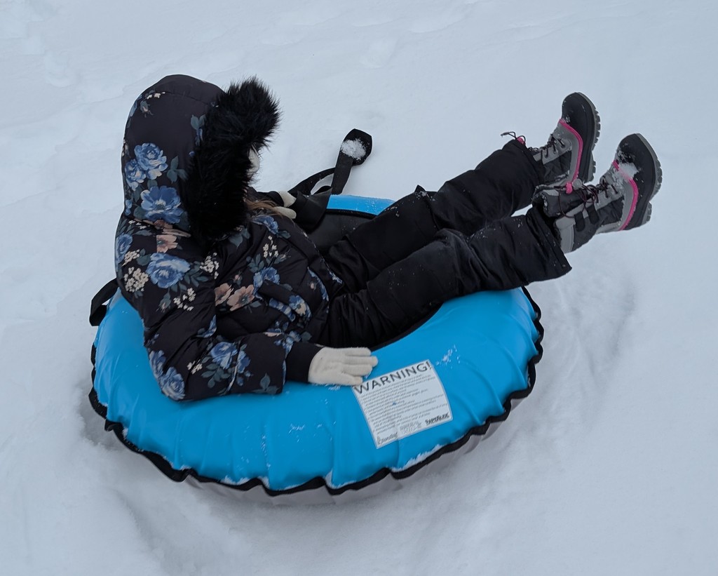 snow tubing students