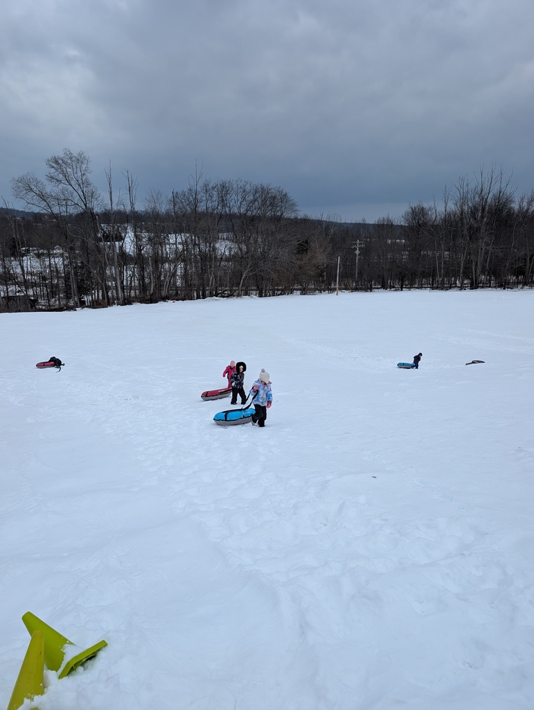 snow tubing students
