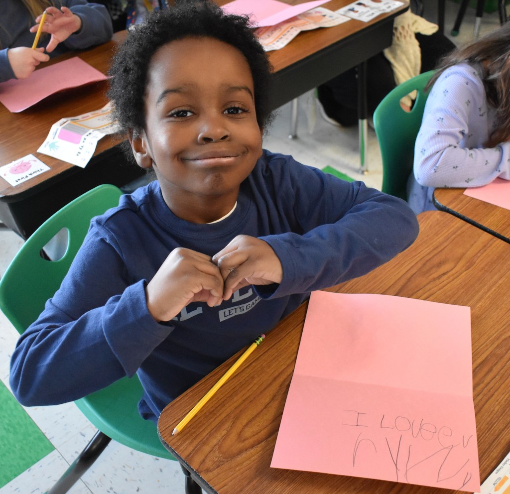 student with valentine