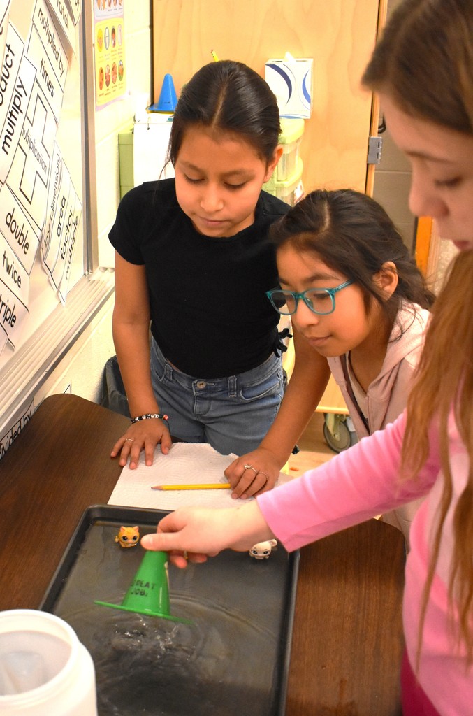 student in science class