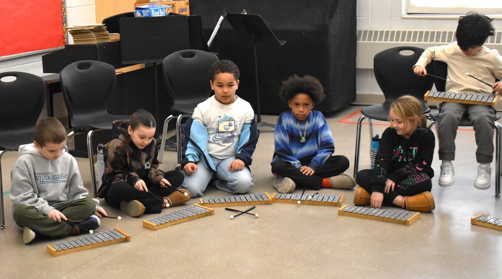 students in music class