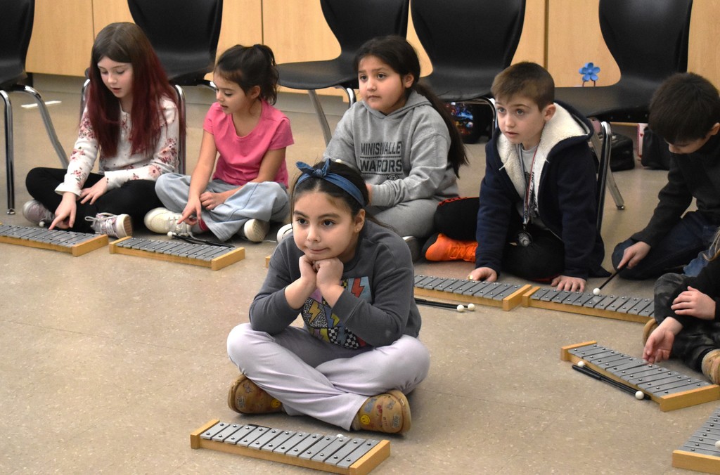 students in music class
