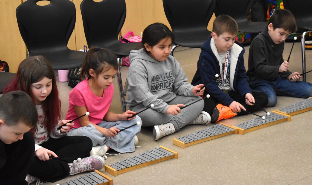 students in music class