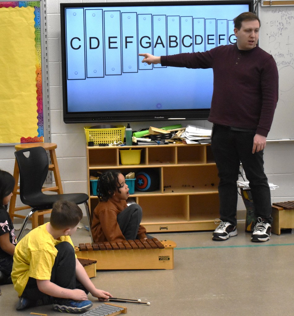 students in music class