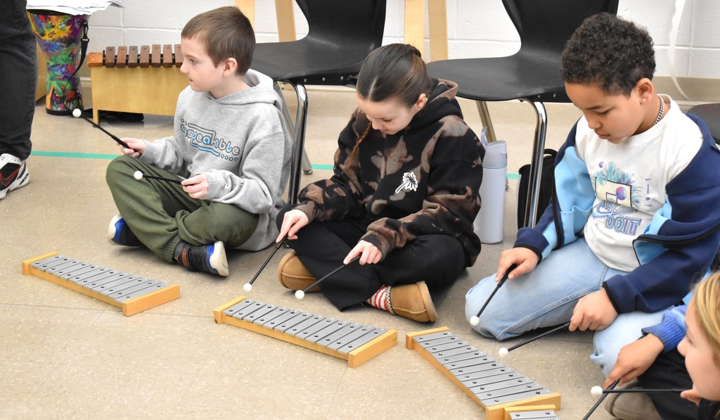 students in music class