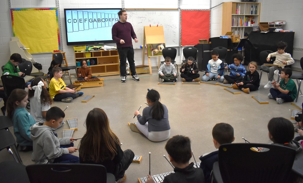 students in music class
