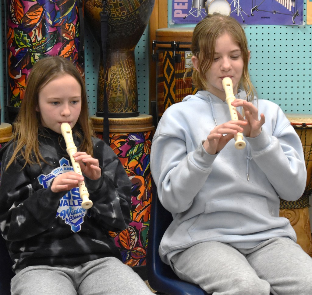students playing recorder