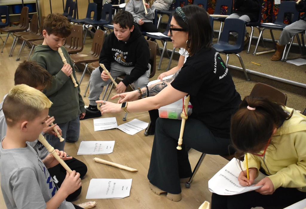 students playing recorder