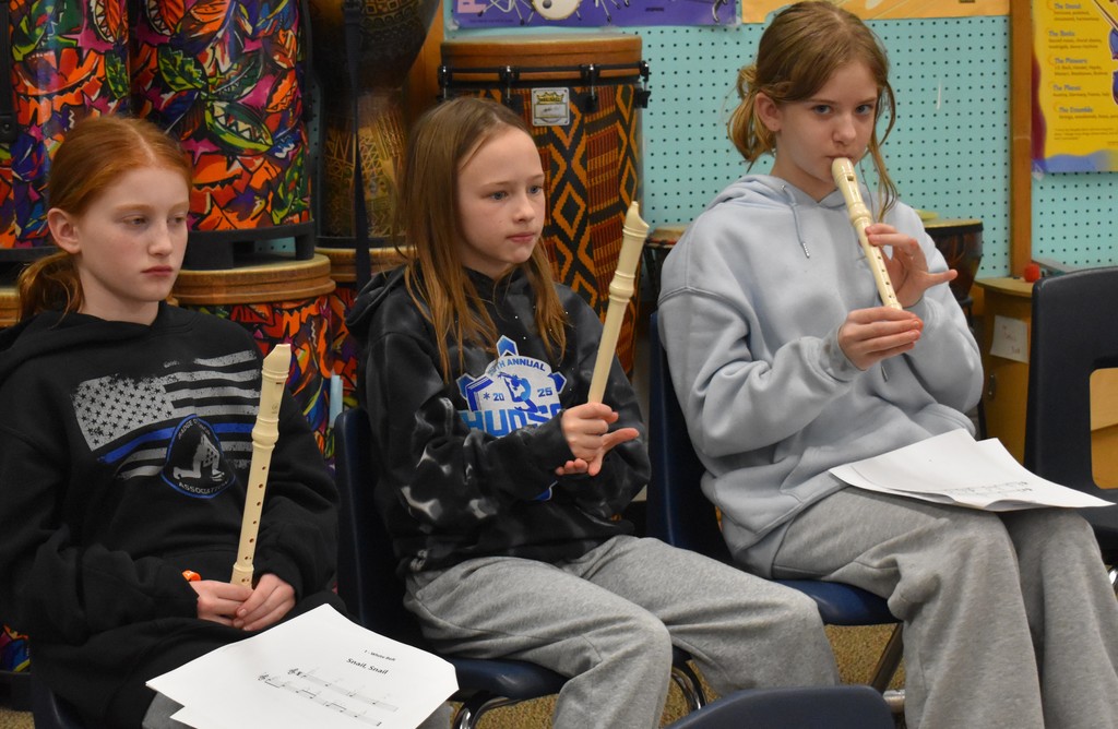 students playing recorder
