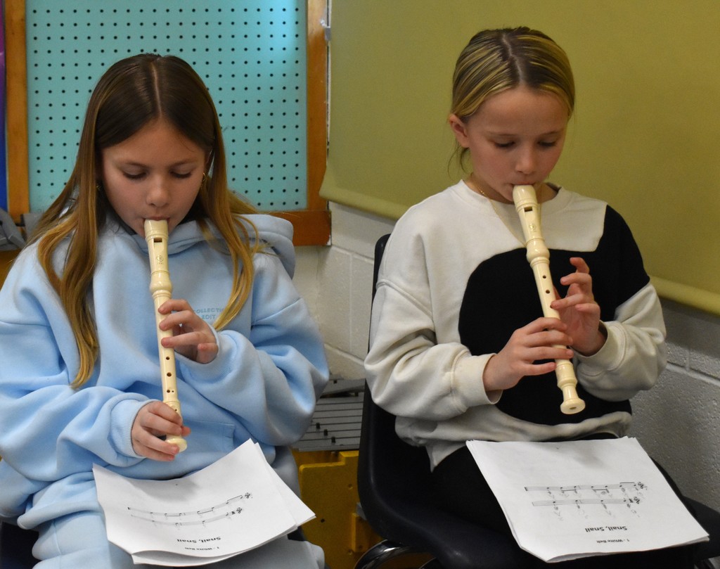 students playing recorder
