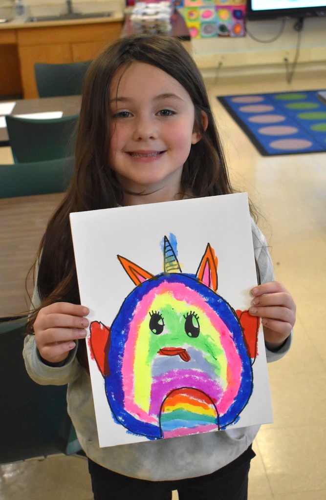 student with artwork