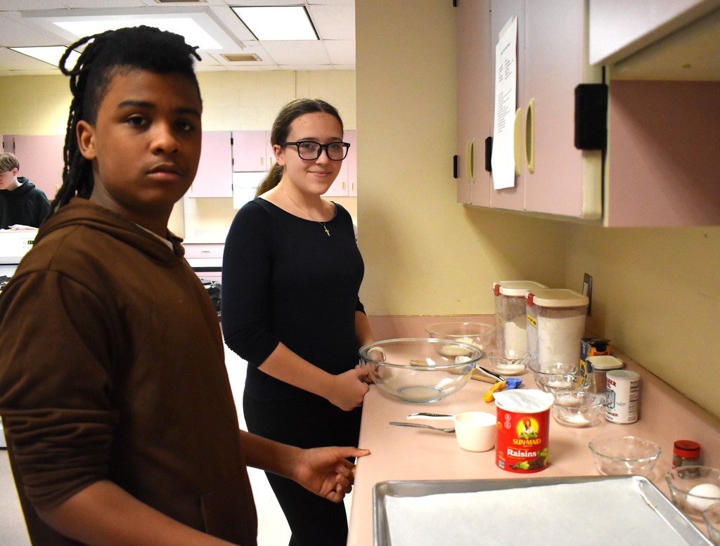 student baking bread