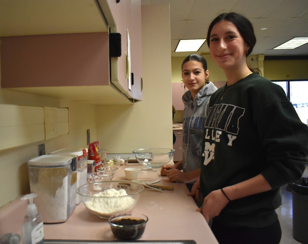 students backing bread