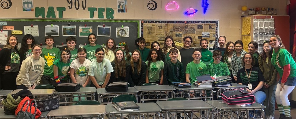 class in green attire