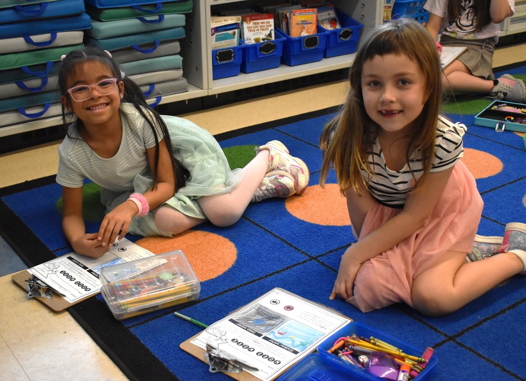 students in class with artwork