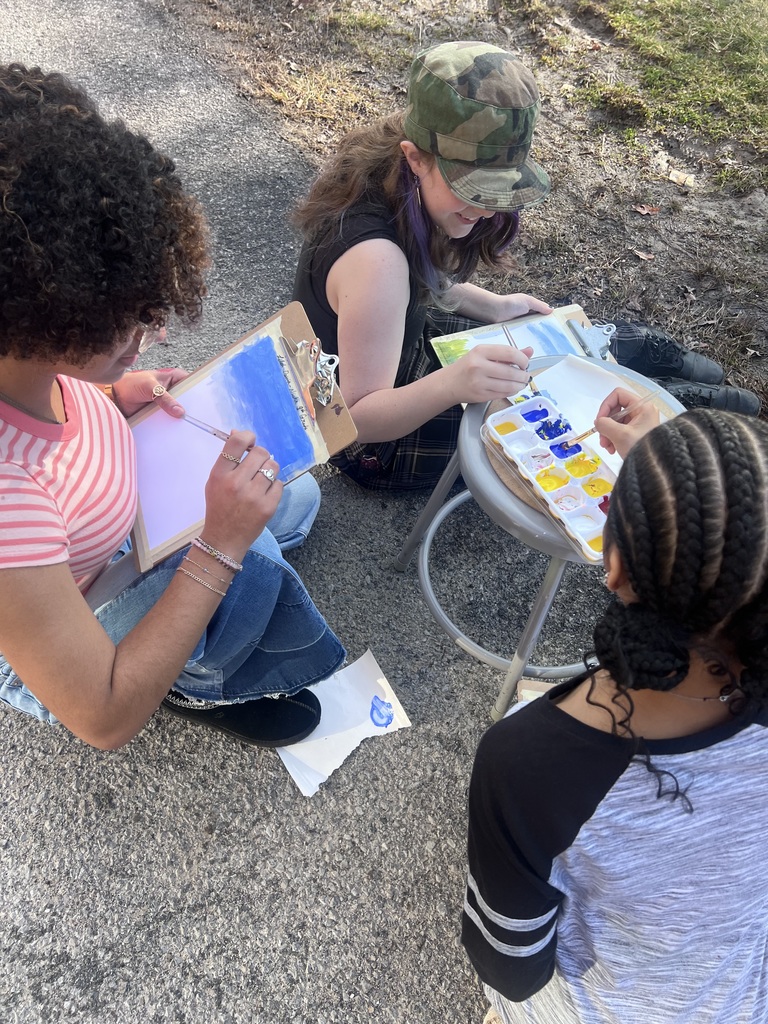 art students with supplies