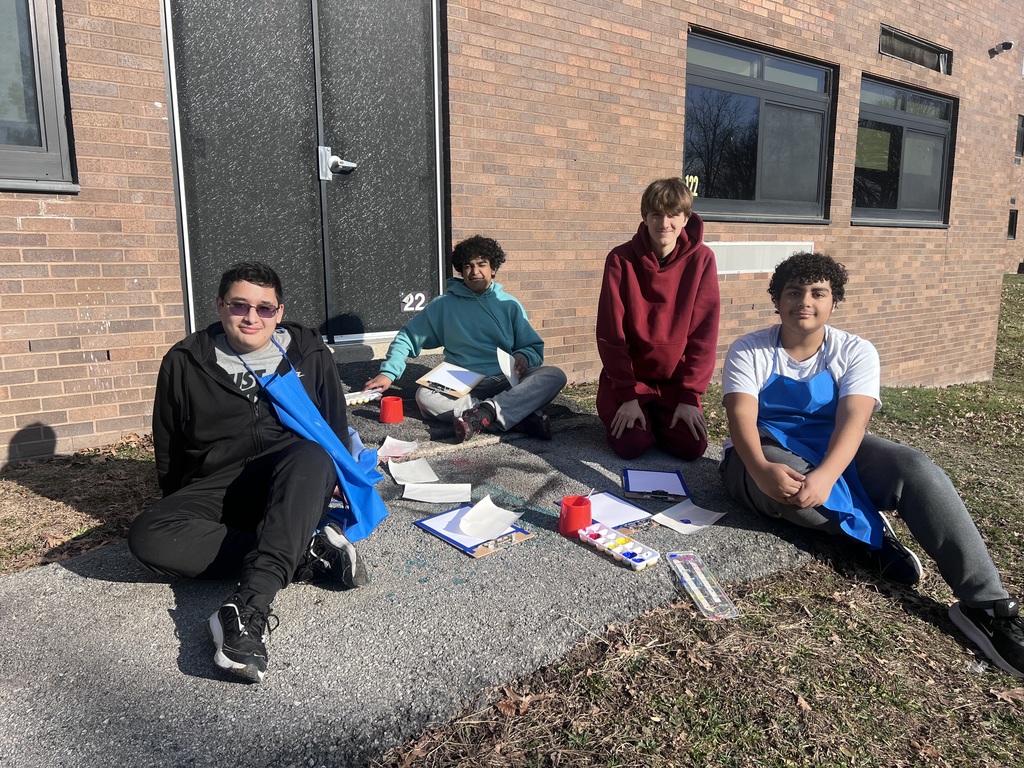 art students with supplies