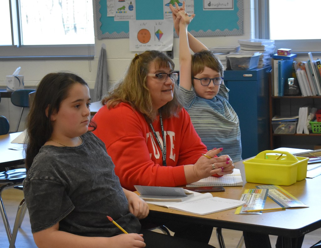 teacher and student in class