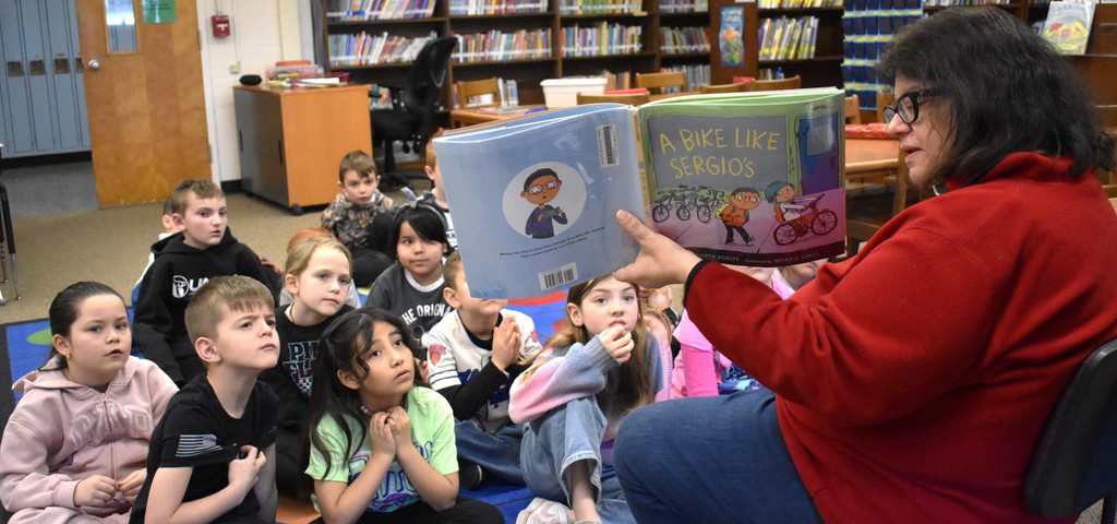 teacher reading to students