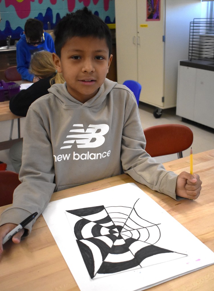 student with artwork
