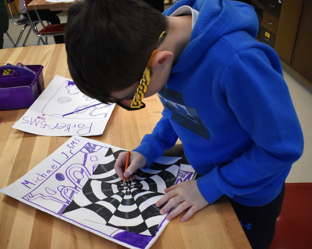 student in art class