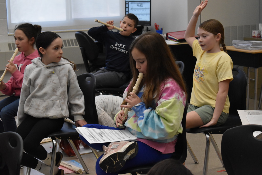 students in music class