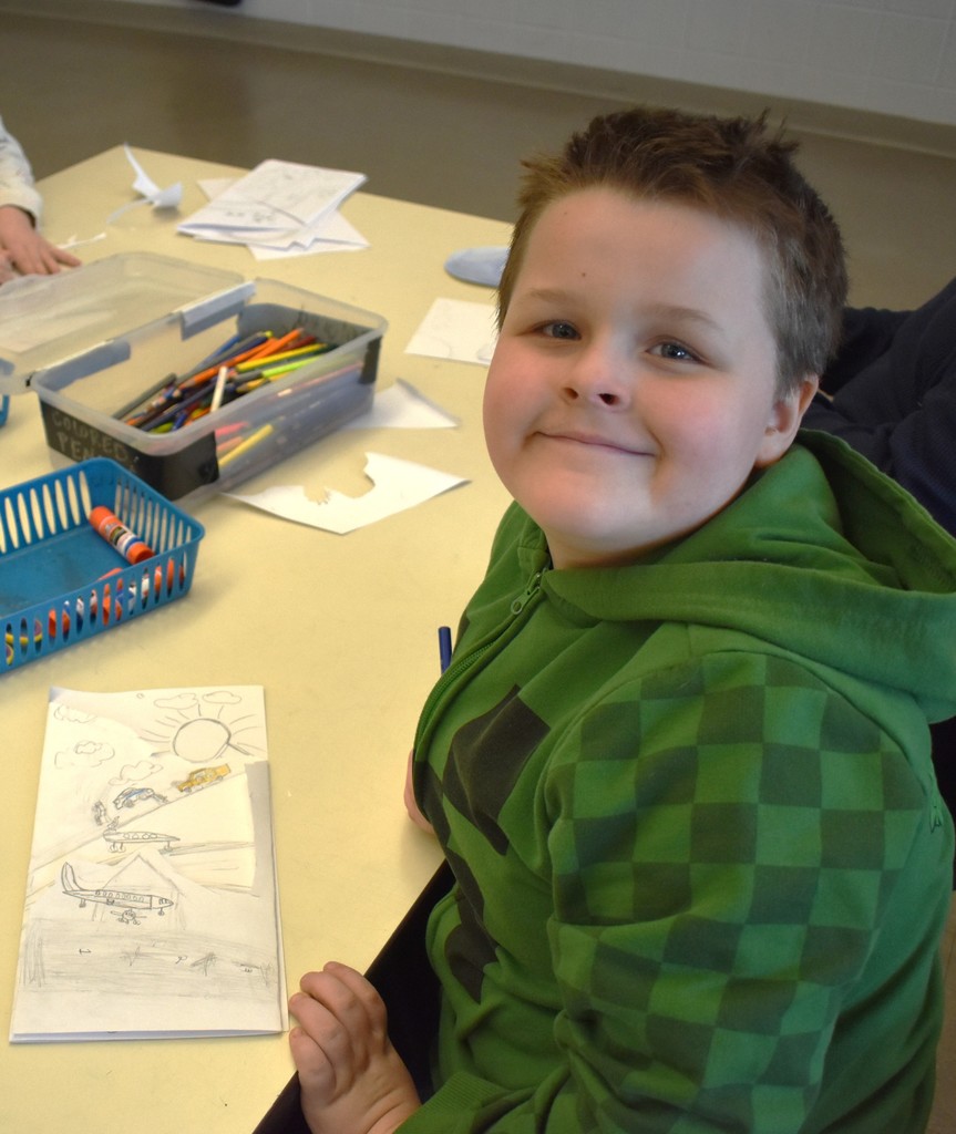 student in art class