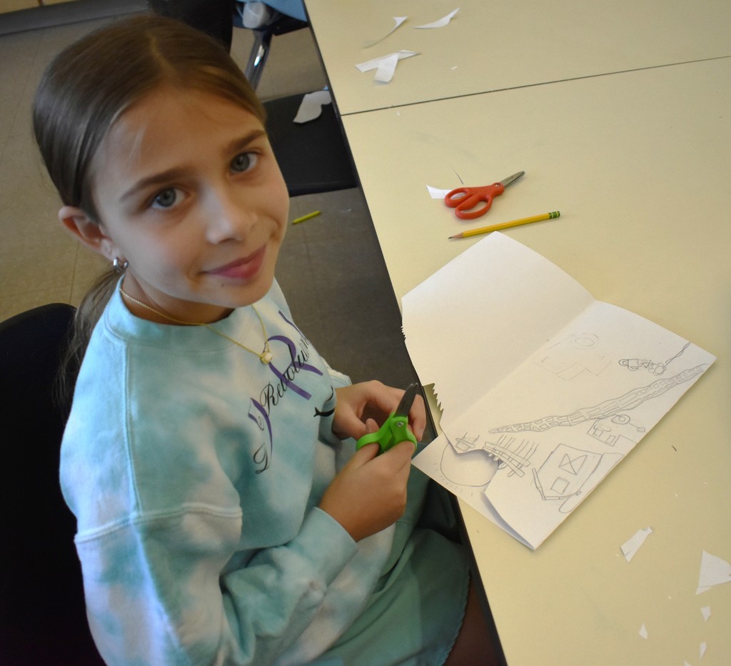 student in art class