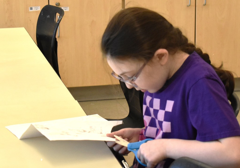 student in art class