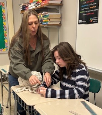 student making scarf