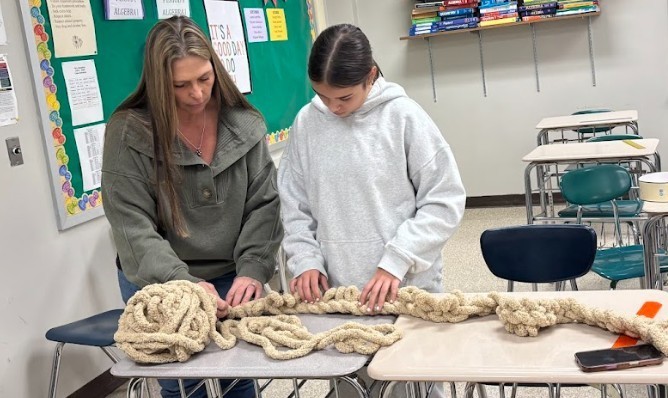 student and teacher makins scarvs