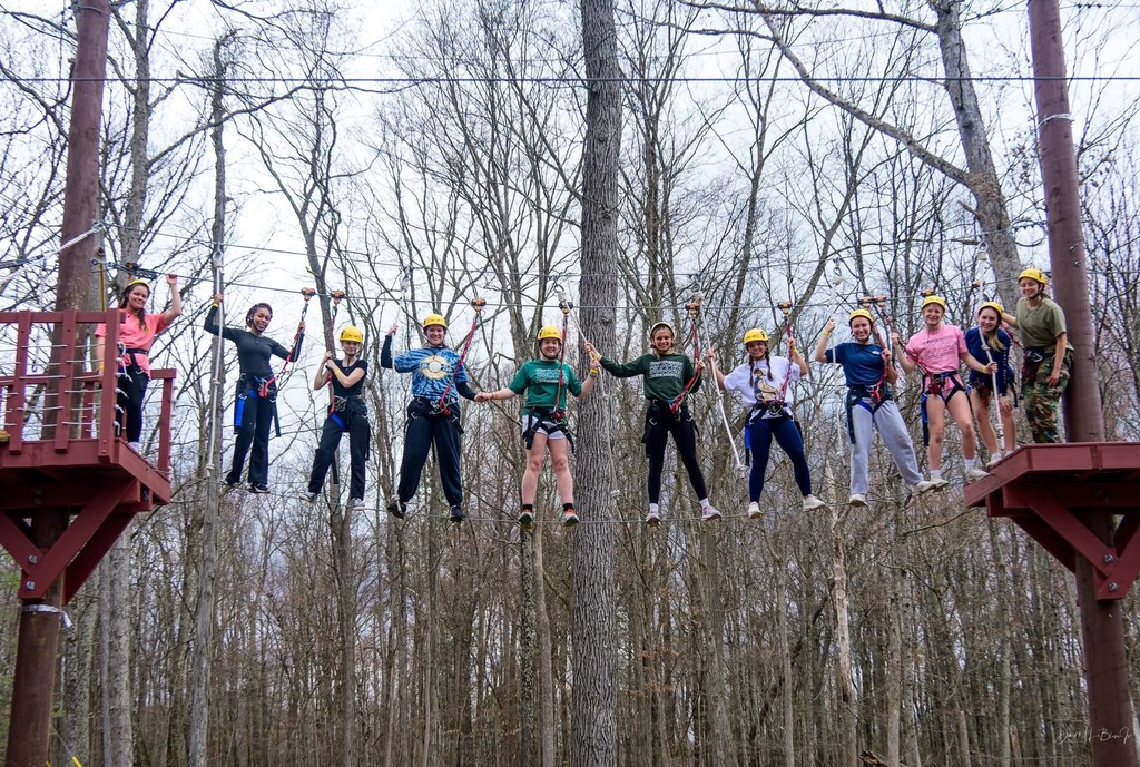 flag football team on ropes course